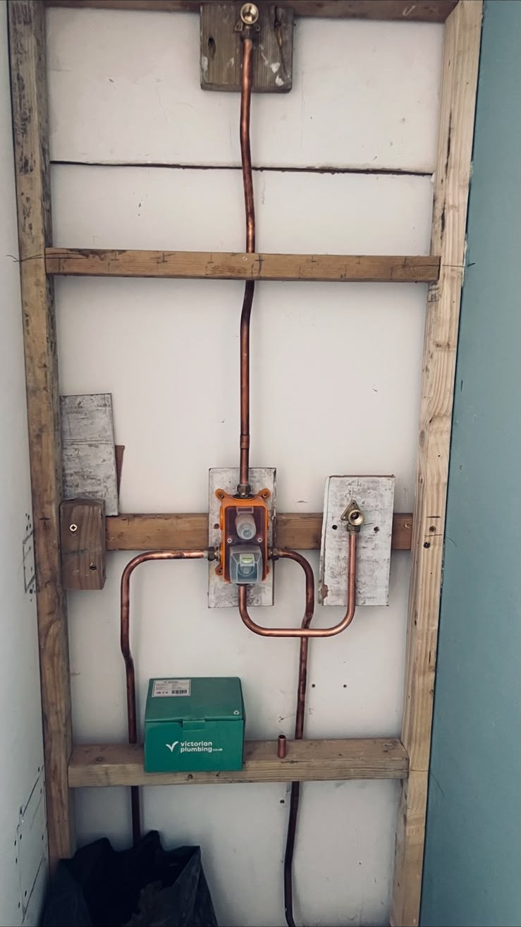 First-fix copper pipework for a concealed shower valve in a stud wall