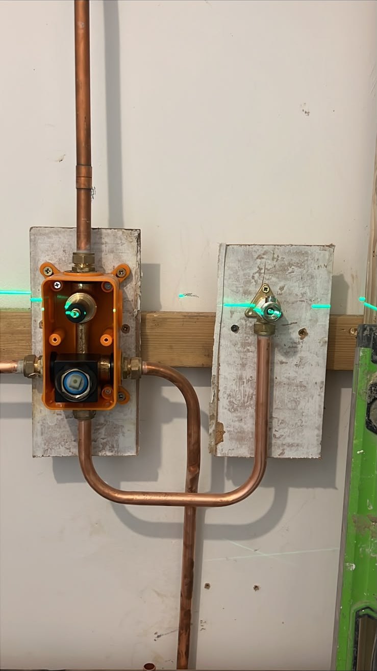 Concealed thermostatic shower valve set out with laser level